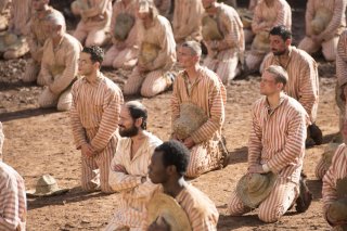 Papillon: Rami Malek, Charlie Hunnam e Michael Socha in una scena del film