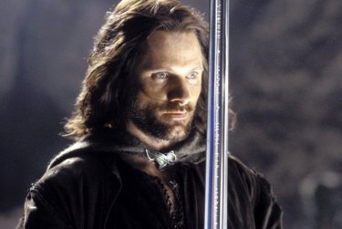 Viggo Mortensen, as Aragorn, wields Anduril, the sword that was broken and reforged for Isildur's heir.