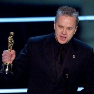 Tim Robbins con l'Oscar per il miglior attore non protagonista