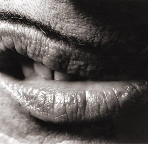 I baffetti di John Waters, suo inconfondibile 'marchio di fabbrica', in uno scatto di Greg Gorman