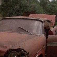 Keith Gordon e John Stockwell in una scena di Christine