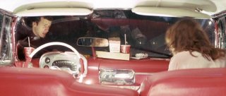 Keith Gordon ed Alexandra Paul in una scena di Christine