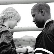 Denzel Washington e Dakota Fanning in una scena del film Man on fire - Il fuoco della vendetta