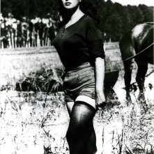 Silvana Mangano in una scena di Riso amaro