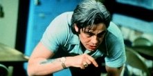 Benicio Del Toro in una scena di 21 Grammi - Il peso dell'anima