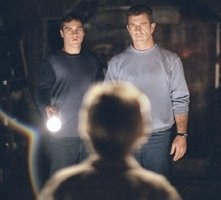 Joaquin Phoenix e Mel Gibson in una scena di Signs