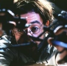 John Cusack in una sequenza di Essere John Malkovich