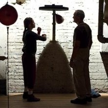 Clint Eastwood e Hilary Swank in una suggestiva scena di Million Dollar Baby