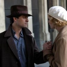 Stuart Townsend con Charlize Theron in una scena di Gioco di donna