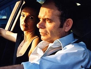 Carole Bouquet e Jean-Pierre Darroussin in una scena di Luci nella notte