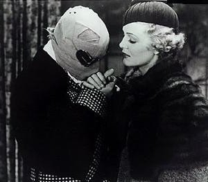 Claude Rains accanto Gloria Stuart in una scena de L'uomo invisibile