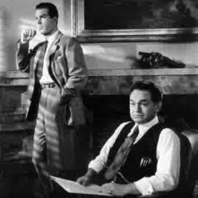 Fred MacMurray ed Edward G. Robinson in una scena di LA FIAMMA DEL PECCATO