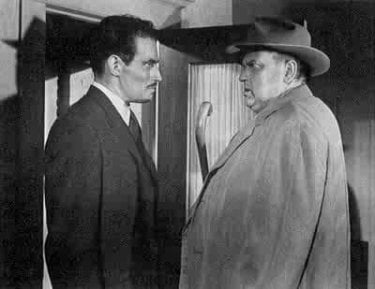 Charlton Heston e Orson Welles in una scena de L'INFERNALE QUINLAN