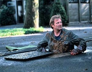 Una scena di Piovono pietre