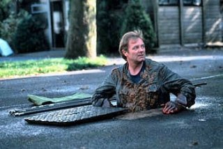 Una scena di Piovono pietre