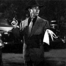 Lauren Bacall, Forbes Murray e Humphrey Bogart in una scena di IL GRANDE SONNO