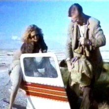 Solveig Dommartin e William Hurt in una scena del film di Wim Wenders, FINO ALLA FINE DEL MONDO