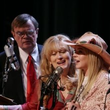 Garrison Keillor, Meryl Streep e Lindsay Lohan in una scena del film Radio America