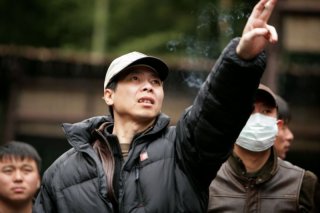 Feng Xiaogang sul set del film The Banquet