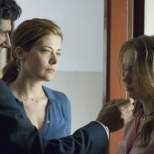 Stefano Dionisi, Sandra Ceccarelli e Elena Bouryka in una scena del film Family Game