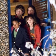 Gina Mantegna, Tyler J. Williams e Dyllan Christopher in una scena del film Mi sono perso il Natale