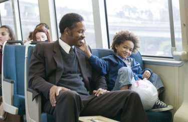 Will Smith e suo figlio Jaden  in una scena del film La ricerca della felicità