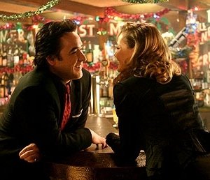 Connie Nielsen con John Cusack in una scena del film The Ice Harvest