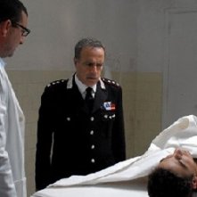 Enrico Montesano in una scena drammatica del film Il Lupo