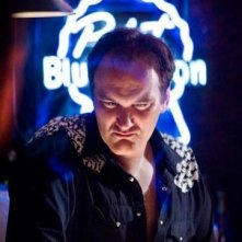 Il regista Quentin Tarantino in una scena del film Death Proof, episodio del double feature Grind House