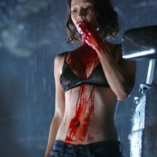 Una sanguinosa Lucy Liu in una scena del film Rise: Blood Hunter