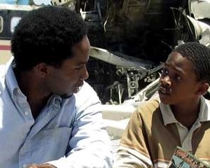 Harold Perrineau con Malcolm David Kelley nel Pilot di Lost