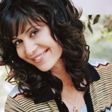 Wallpaper di Catherine Bell in posa sorridente
