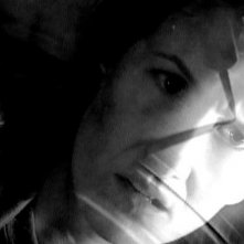 Una bella immagine di Laura Dern in una scena di INLAND EMPIRE