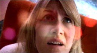 Un primo piano di Laura Dern in una scena di INLAND EMPIRE