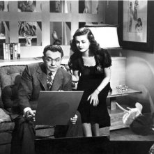 Joan Bennett e Edward G. Robinson in una scena de La donna del ritratto