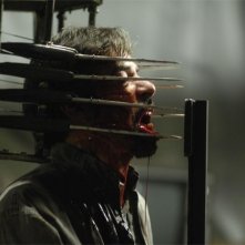 Una scena splatter del film Saw 4