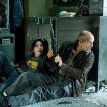 Justin Long e Bruce Willis  in una scena del film Die Hard - Vivere o morire