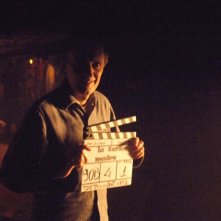 Dario Argento con il ciak del film La terza Madre