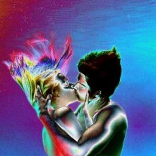 Evan Rachel Wood e Jim Sturgess in una colorata sequenza di Across the Universe