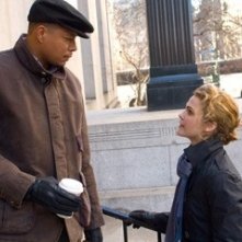 Terrence Howard e Keri Russell in una scena di August Rush