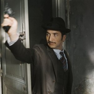 Una sequenza del poliziesco Triplice Inganno