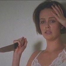 Charlize Theron in una scena de L'AVVOCATO DEL DIAVOLO