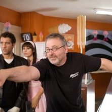 Clive Owen e Michael Davis con Monica Bellucci sul set del film Shoot 'Em Up