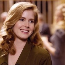 Amy Adams in una scena del film La guerra di Charlie Wilson