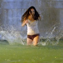 La sexy Valentina Izumì in una scena del film Questa notte è ancora nostra