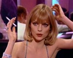 Charlize Theron nel look Scarface di Elvira Hancock: Michelle Pfeiffer impressionata dal risultato