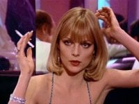 Charlize Theron nel look Scarface di Elvira Hancock: Michelle Pfeiffer impressionata dal risultato