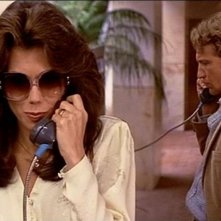 Deborah Shelton e Craig Wasson in una scena di OMICIDIO A LUCI ROSSE