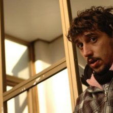 Corrado Fortuna in una sequenza del film Chi nasce tondo...