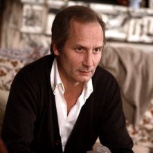 Hippolyte Girardot in una sequenza del film Un conte de Noël